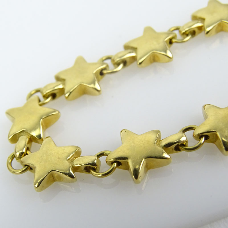Circa 1980s Tiffany & Co 18 Karat Yellow Gold Stars Bracelet with Box.