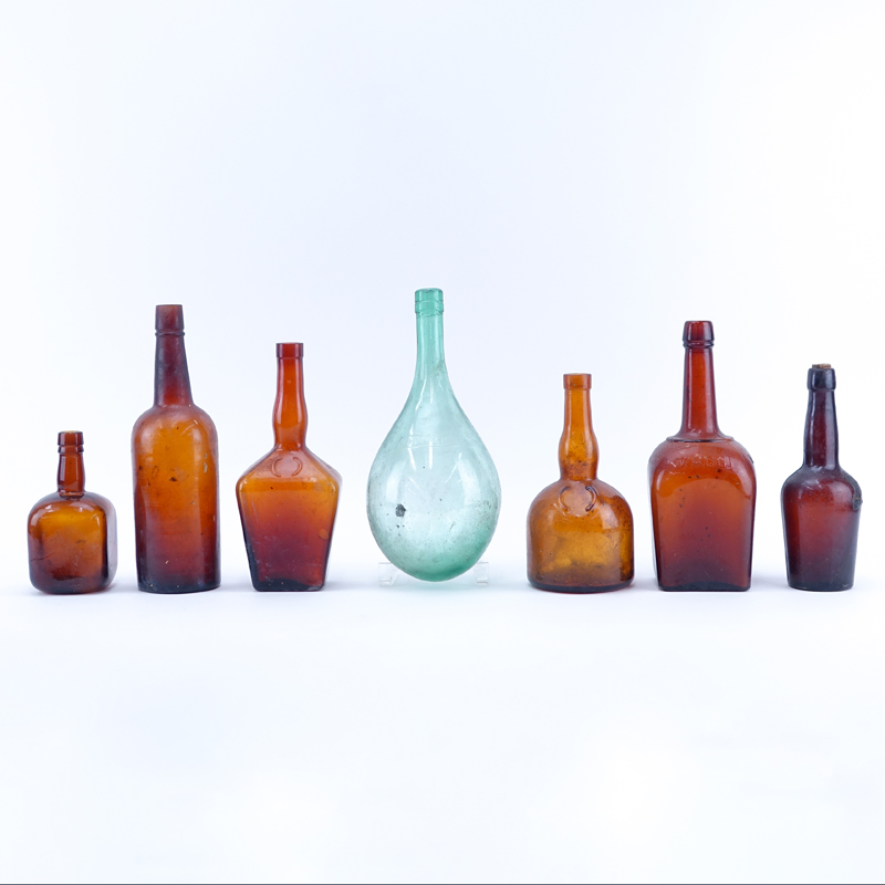 Collection of Seven (7) Antique Glass Bottles.