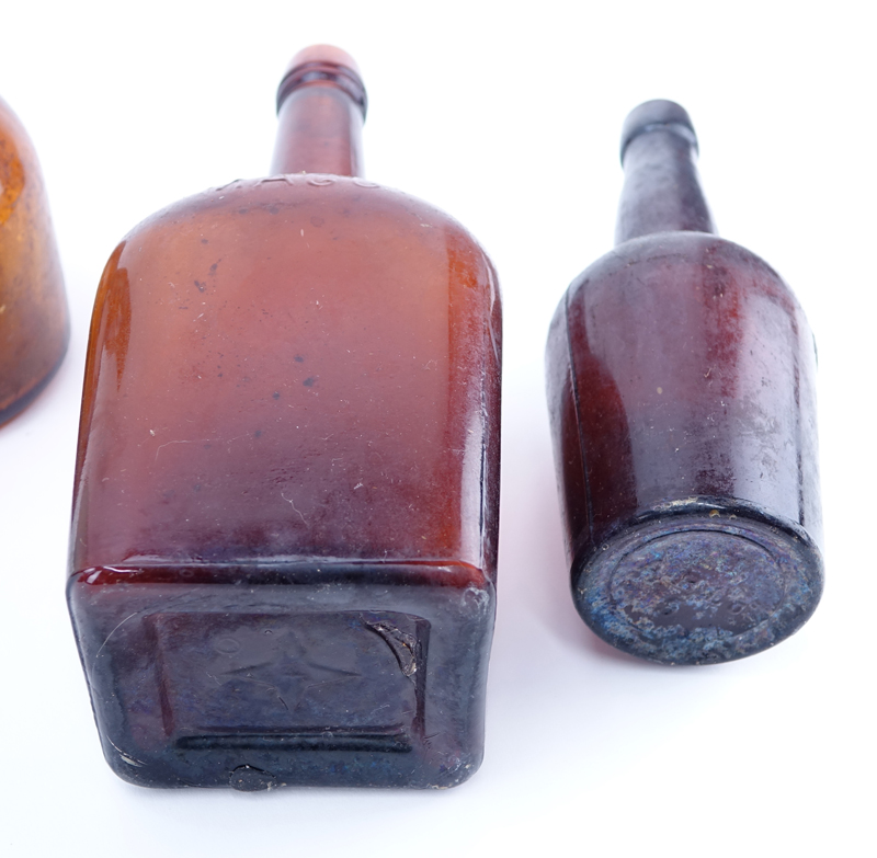 Collection of Seven (7) Antique Glass Bottles.