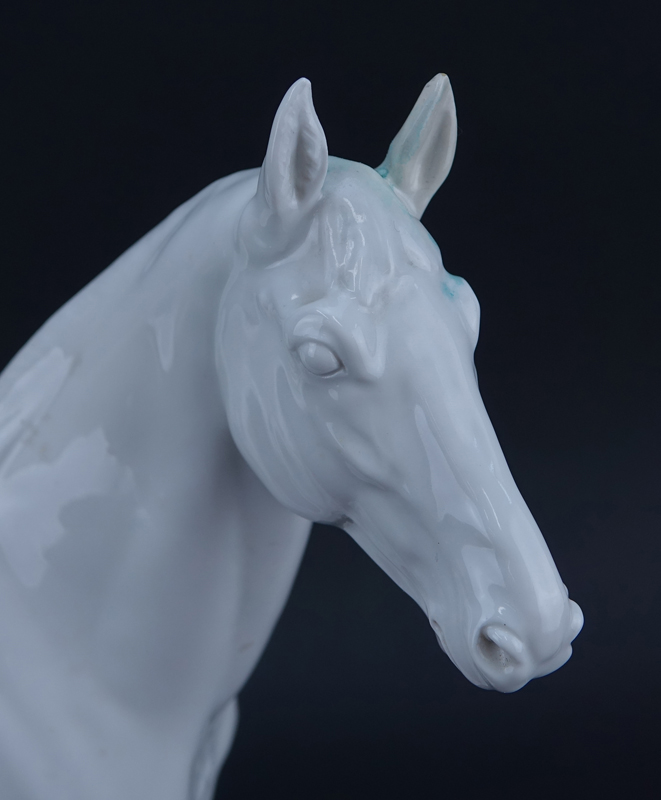 Meissen Blanc de Chine Model of a Horse Mounted on Wooden Base.