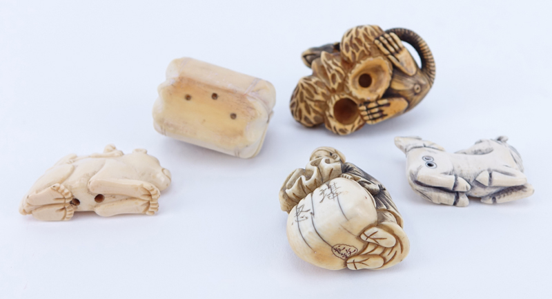Collection of Five (5) Carved Netsuke. Includes various figures of animals and a man.