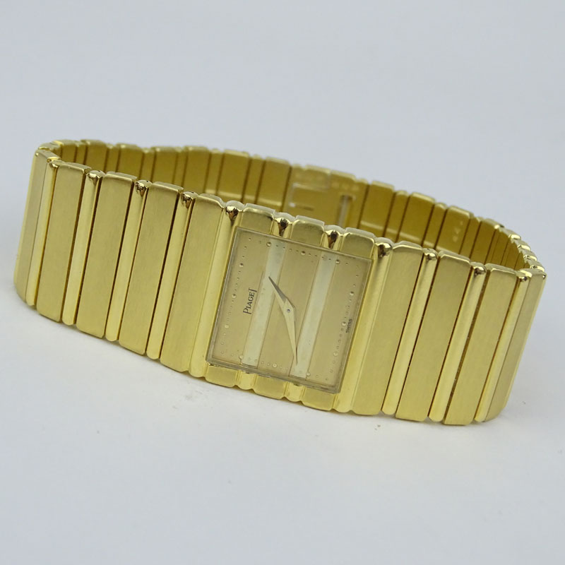 Men's Vintage Piaget Polo 18 Karat Yellow Gold Bracelet Watch with Quartz Movement 381513 with Box.