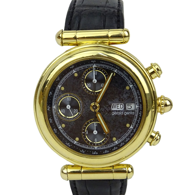 Men's Vintage Gerald Genta 18 Karat Yellow Gold Chronograph Automatic Movement Watch with Russian Meteor Dial, Crocodile Strap and 18 Karat Yellow Gold Buckle. 
