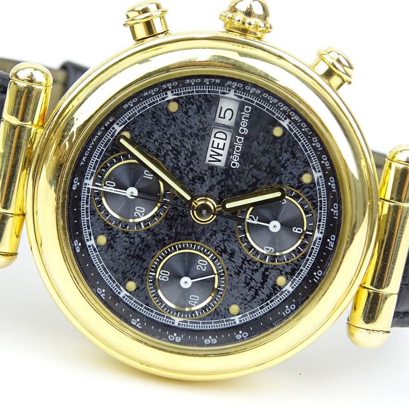 Men's Vintage Gerald Genta 18 Karat Yellow Gold Chronograph Automatic Movement Watch with Russian Meteor Dial, Crocodile Strap and 18 Karat Yellow Gold Buckle. 