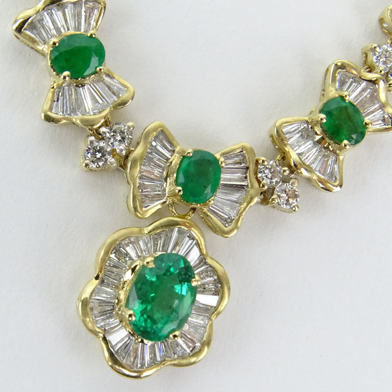 Vintage Approx. 2.20 Carat Baguette and Round Brilliant Cut Diamond, Oval Cut Emerald and 14 Karat Yellow Gold Pendant Necklace.