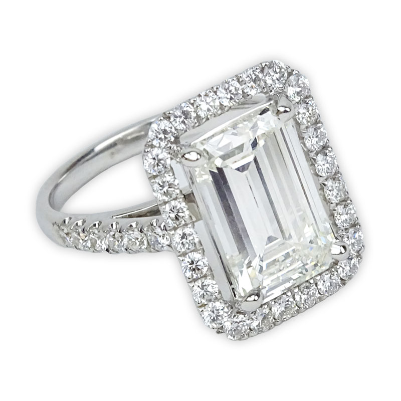 GIA Certified 3.70 Carat Emerald Cut Diamond and 18 Karat White Gold Engagement Ring.