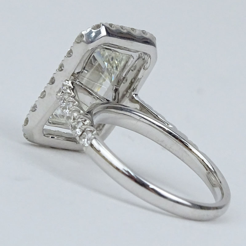 GIA Certified 3.70 Carat Emerald Cut Diamond and 18 Karat White Gold Engagement Ring.