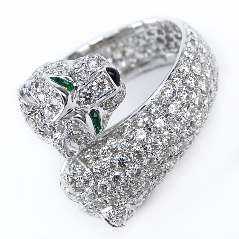 Cartier style Approx. 6.08 Carat Micro Pave Set Round Brilliant Cut Diamond and 18 Karat White Gold Panther Ring with Emerald Eye Accents.