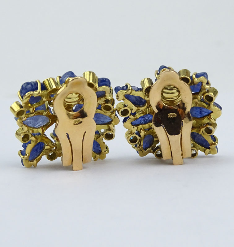 10.0 Carat Carved Sapphire, 2.0 Carat Round Brilliant Cut Diamond and 18 Karat Yellow Gold Clip Earrings.