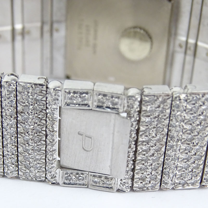 . 14.0 Carat Micro Pave Set Round Brilliant Cut Diamond and 18 Karat White Gold Bracelet Watch with Quartz Movement.