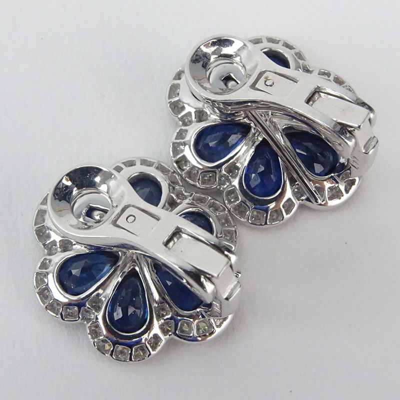 4.03 Carat Pear Shape Sapphire, .78 Carat Pave Set Diamond and Platinum Earrings. 