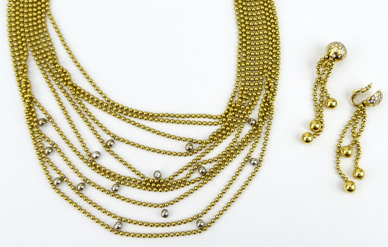 Circa 1999 Cartier Round Brilliant Cut Diamond and 18 Karat Yellow Gold Multi Strand Bead Necklace and Earring Suite