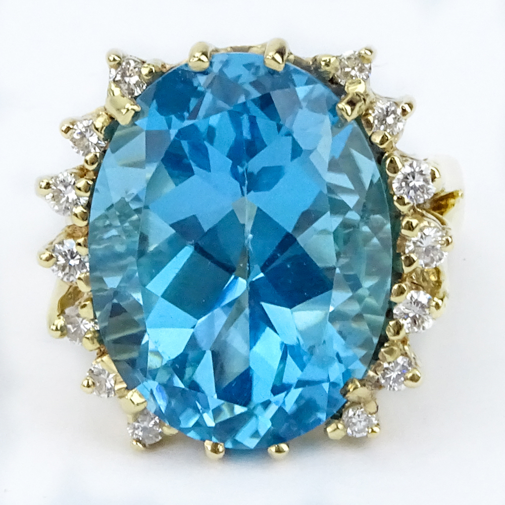 Vintage Oval Cut London Blue Sapphire, Diamond and 14 Karat Yellow Gold Ring