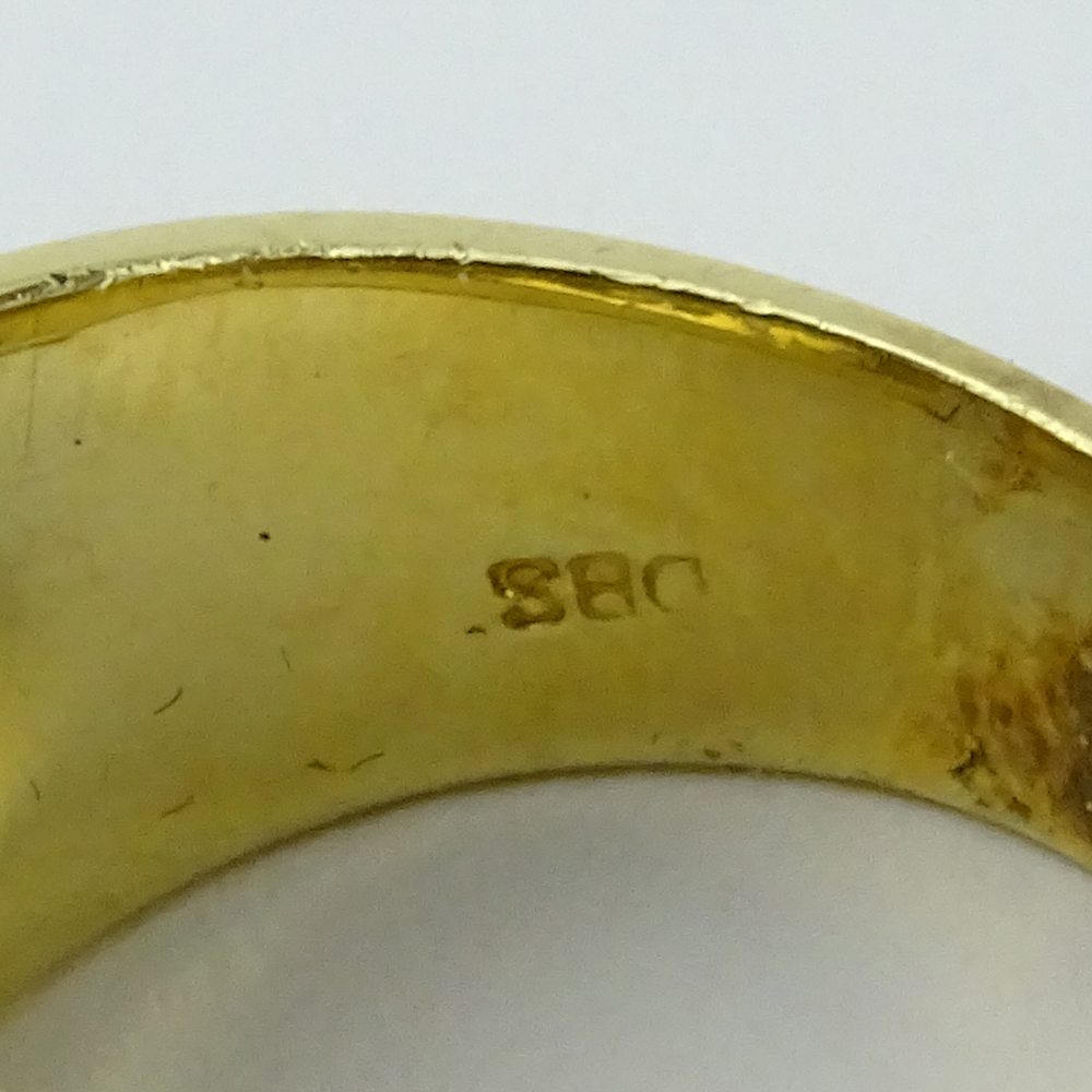  1.0 Carat Oval Cut Sapphire, 1.52 Carat Pave Set Diamond and 14 Karat Yellow Gold Ring. 