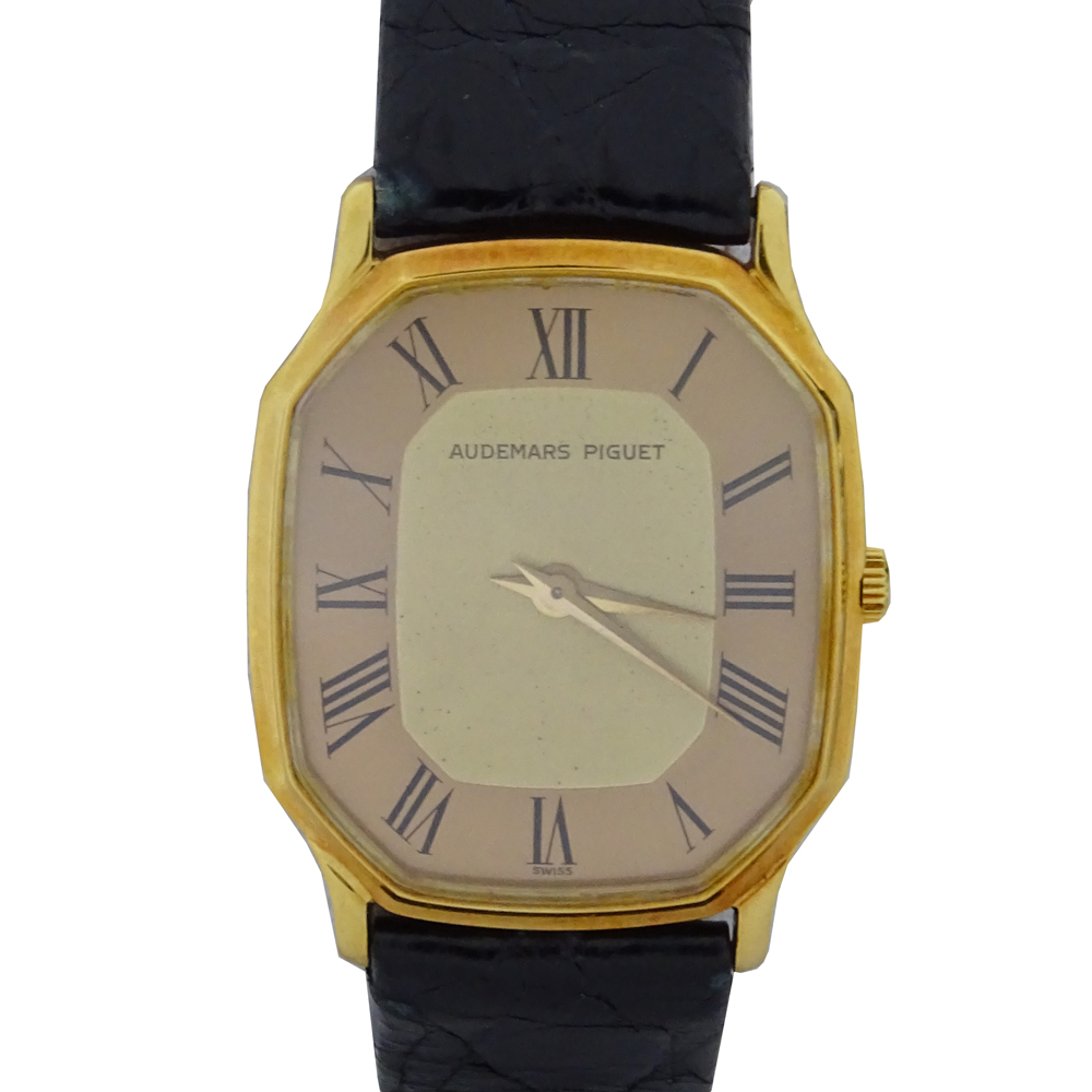 Vintage Audemars Piguet 18 Karat Yellow Gold Watch with Roman Numeral Hour Markers, Manual Movement, 18 Karat Yellow Gold Buckle, Crocodile Strap