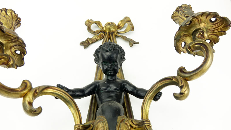 Pair of Louis XVI Style Gilt Bronze Figural Sconces