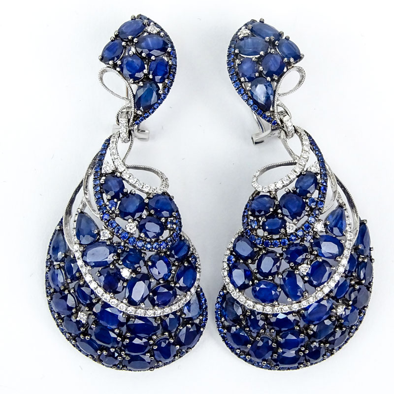 40.0 Carat Pear Shape, Oval and Round Cut Sapphire and 18 Karat White Gold Earrings accented with approx. 