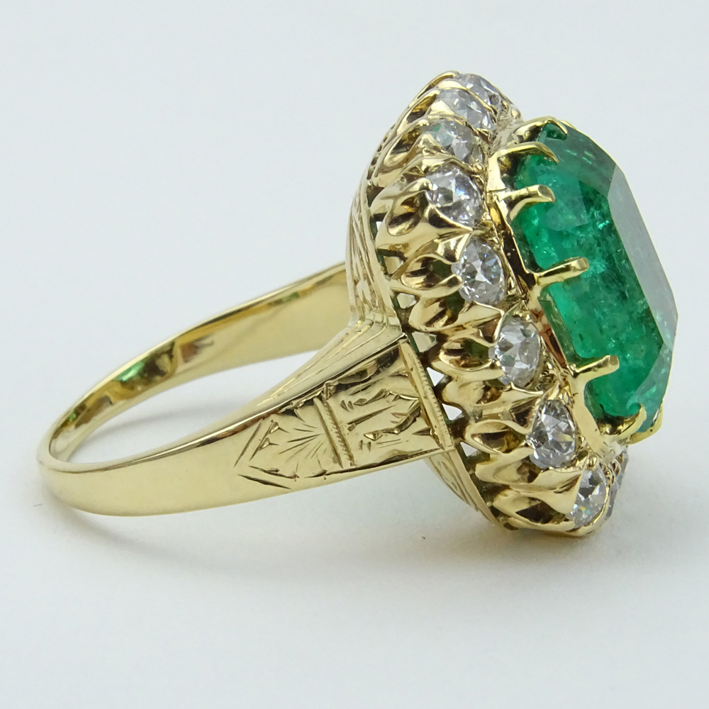  8.0 Carat Colombian Emerald, 2.0 Carat Round Brilliant Cut Diamond and 14 Karat yellow Gold Ring.