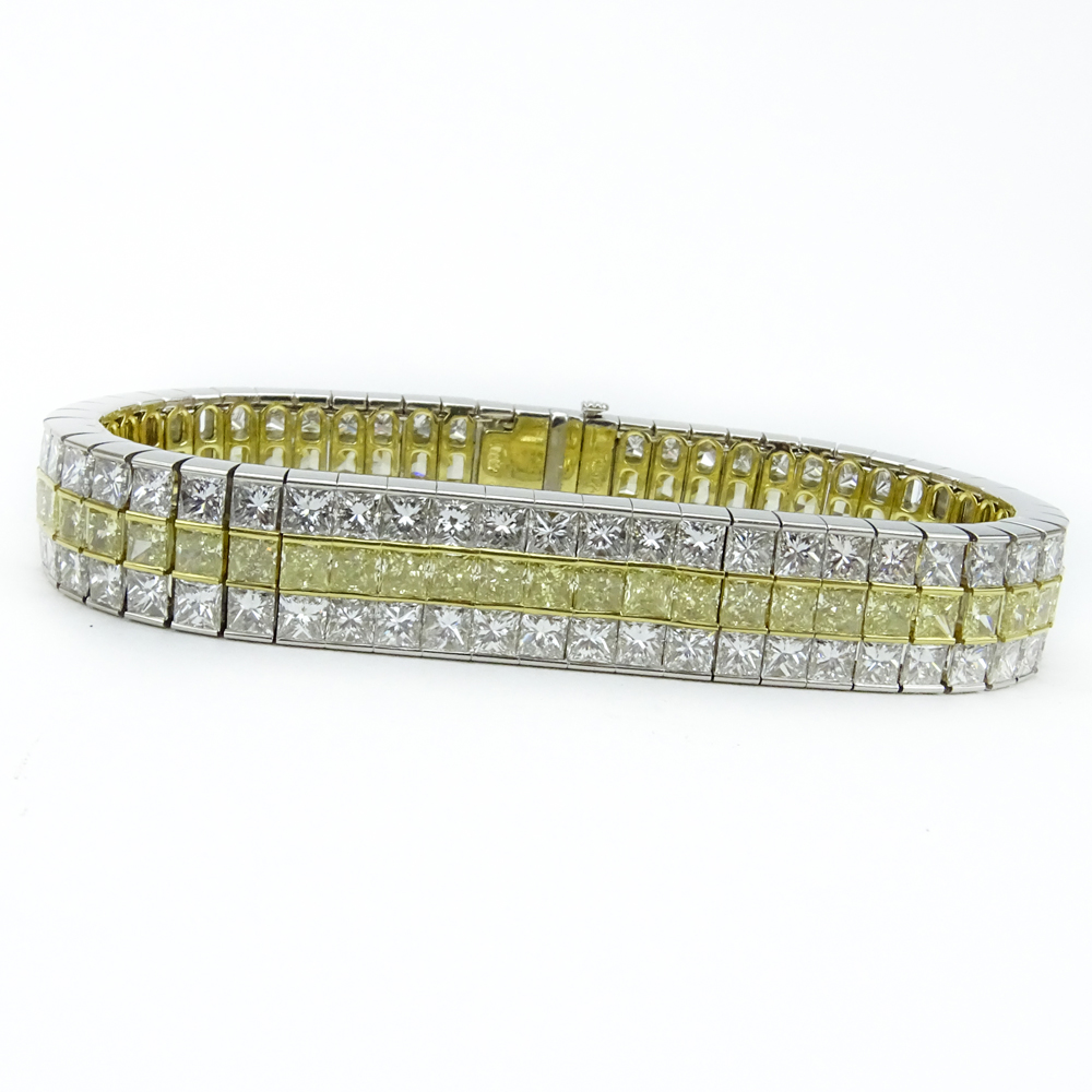 Kwiat Collection, New York Approx. 41.25 Carat One Hundred Sixty Five (165) Princess Cut Fancy Intense Yellow and White Diamond, Platinum and 18 Karat Yellow Gold Bracelet.