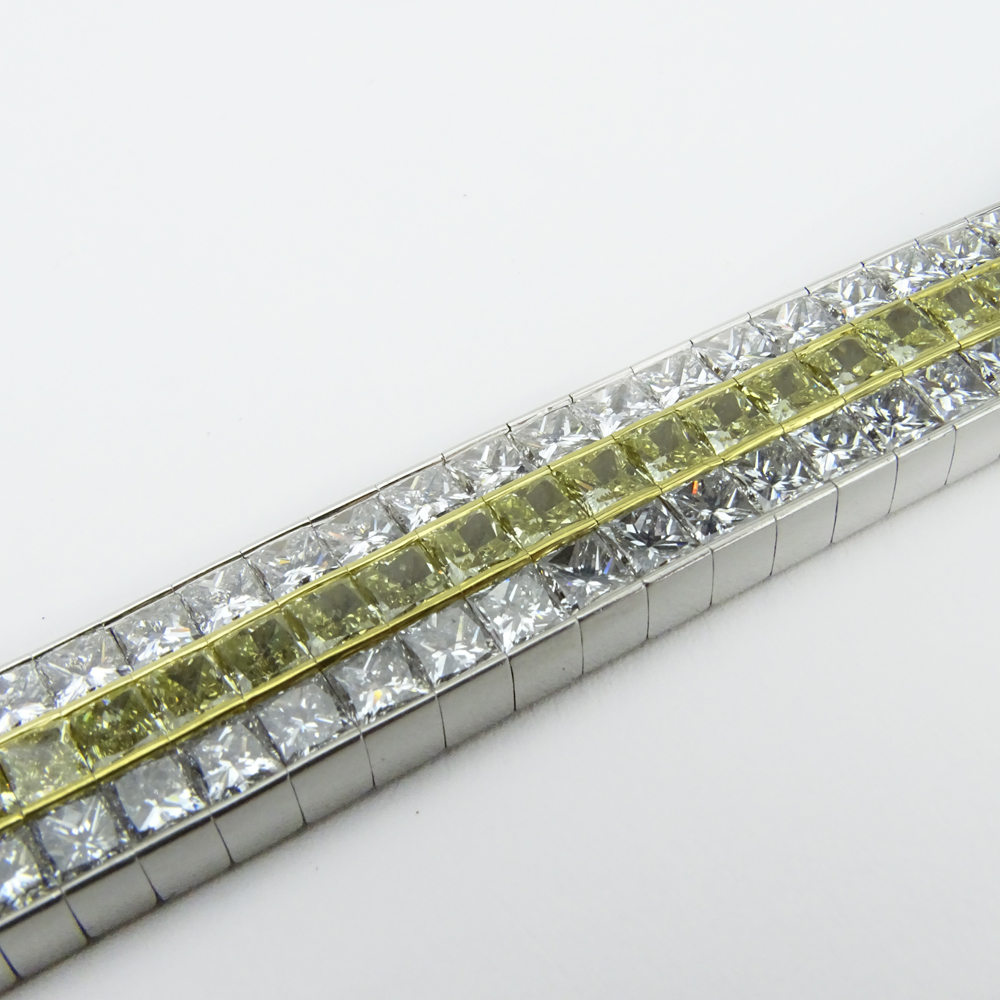 Kwiat Collection, New York Approx. 41.25 Carat One Hundred Sixty Five (165) Princess Cut Fancy Intense Yellow and White Diamond, Platinum and 18 Karat Yellow Gold Bracelet.