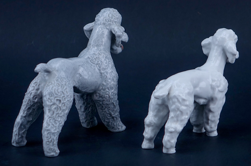 Two Porcelain Poodle Figurines