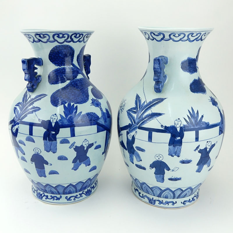 Pair of Mid Century Blue and White Chinoiserie Porcelain Vases