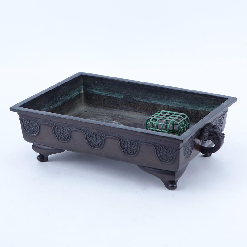 Chinese Bronze Footed Planter With Figural Handles