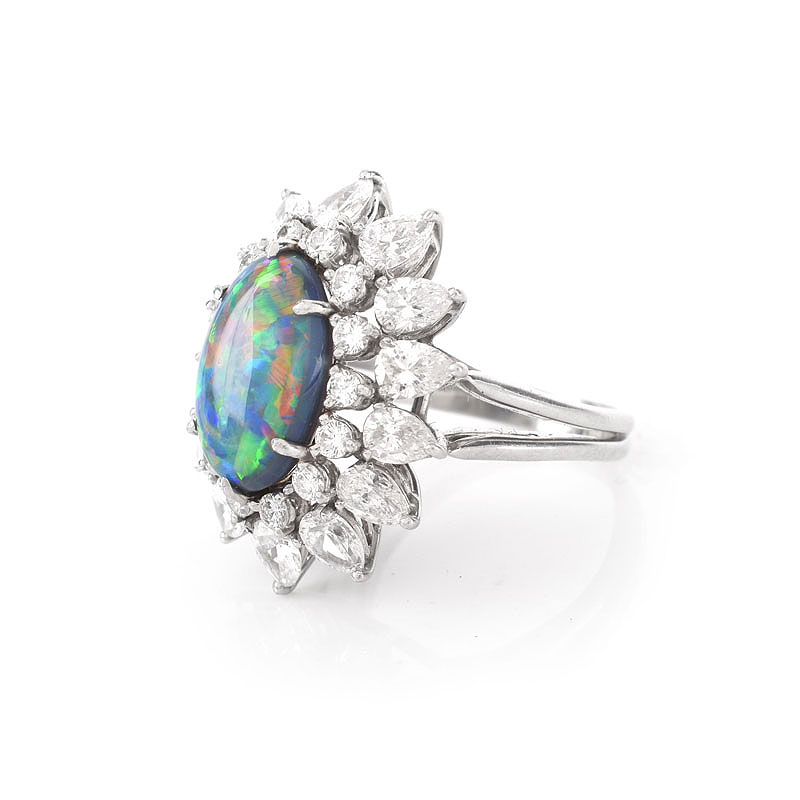 Vintage Tiffany & Co Oval Cabochon Black Opal, Pear Shape and Round Brilliant Cut Diamond and Platinum Ring