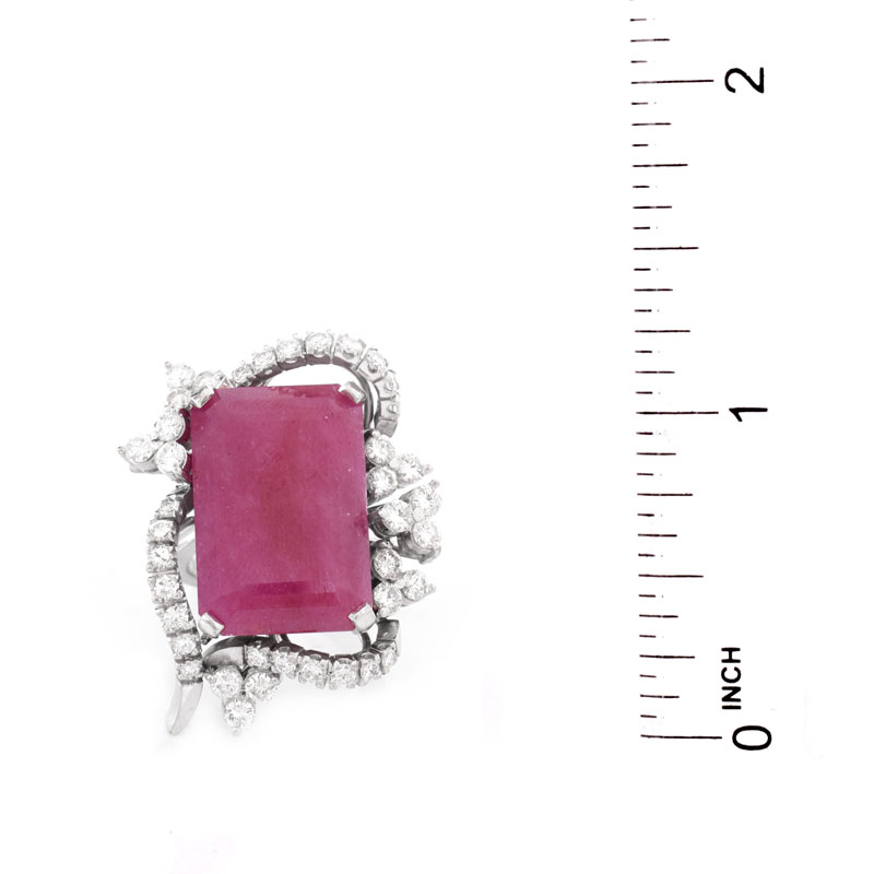Vintage Large Emerald Cut Ruby, 7.50 Carat Round Brilliant Cut Diamond and Platinum Ring and Clip Earrings Suite