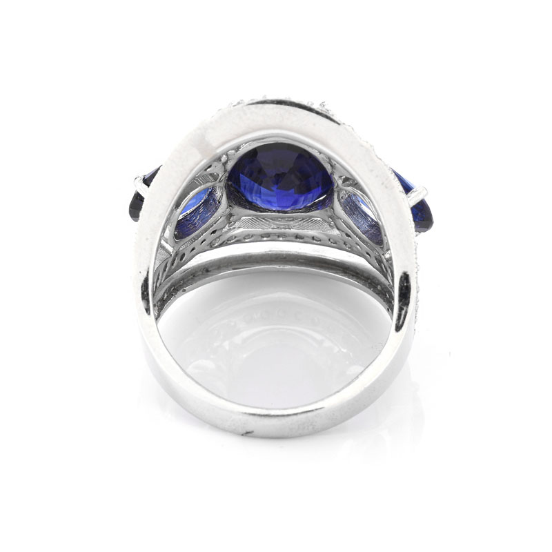 Approx. 10.30 Carat Oval Cut Synthetic Sapphire, 1.20 Carat Round Brilliant Cut Diamond and 18 Karat White Gold Ring