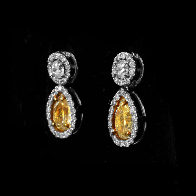 EGL Certified 2.04 Carat TW Fancy Light Yellow Diamond, .75 Carat Round Brilliant Cut Diamond and Platinum Earrings