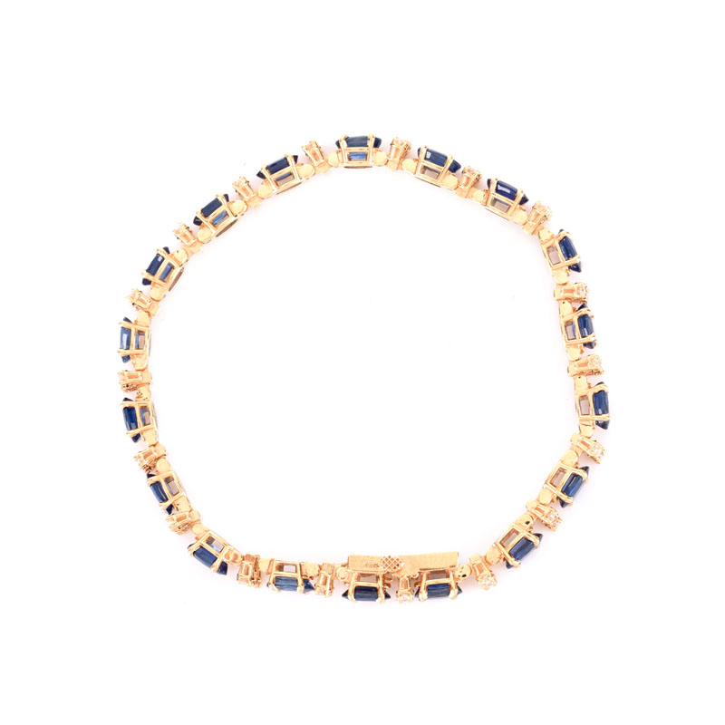 Vintage Oval Cut Synthetic Sapphire, Round Brilliant Cut Diamond and 14 Karat Yellow Gold Line Bracelet