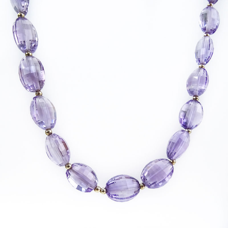 Approx. 162.0 Carat Oval Briolette Cut Graduated Amethyst Bead and 14 Karat Yellow Gold Necklace