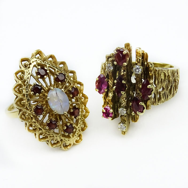 Two (2) Rings, a Vintage Six (6) Oval Cut Ruby, Diamond and 14 Karat Yellow Gold Cluster Ring together with Vintage Ruby, Opal and 14 Karat Yellow Gold Cluster Ring