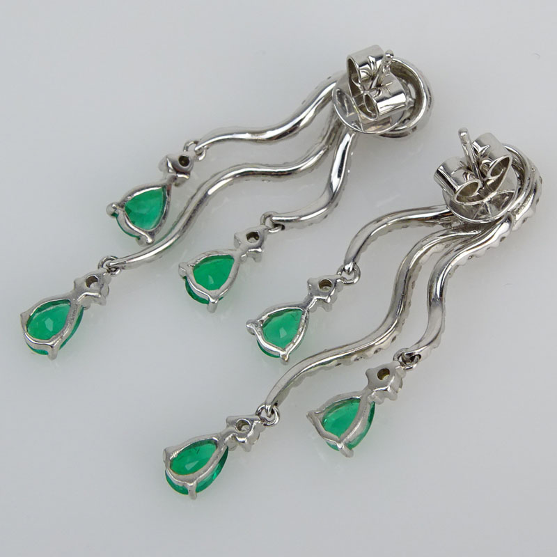 Approx. 1.80 Carat Pear Shape Emerald, 1.60 Carat Round Brilliant Cut Diamond and 18 Karat White Gold Earrings