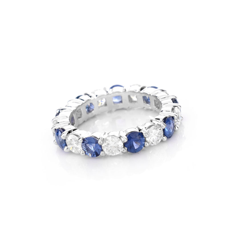 Approx. 2.62 Carat Round Brilliant Cut Sapphire, 1.85 Carat Round Brilliant Cut Diamond and 18 Karat White Gold Eternity Band