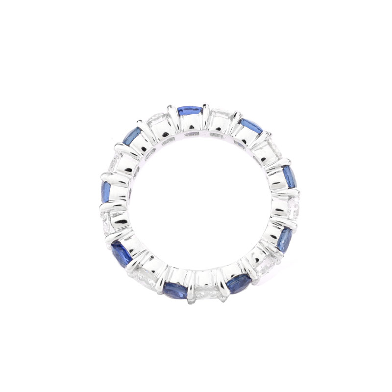 Approx. 2.62 Carat Round Brilliant Cut Sapphire, 1.85 Carat Round Brilliant Cut Diamond and 18 Karat White Gold Eternity Band