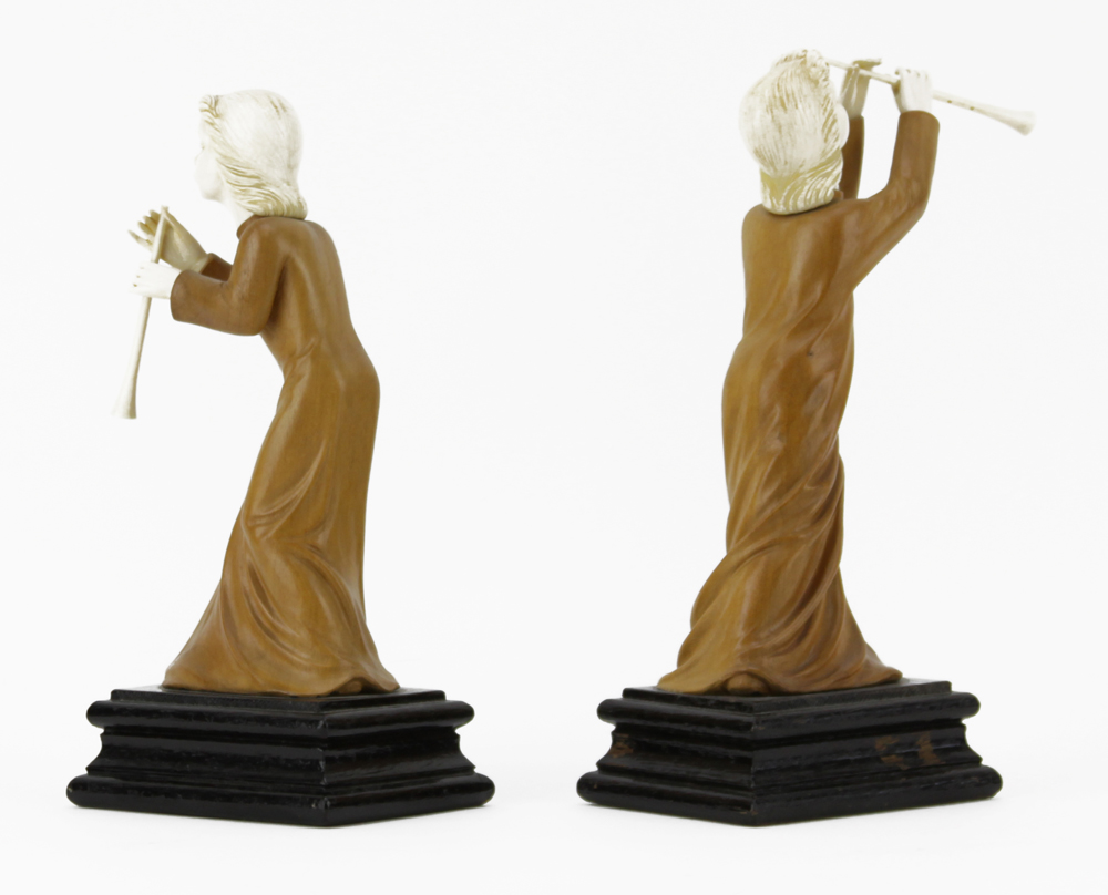 In the manner of Simon Troger, Austrian (1683-1768) Carved Wood and Ivory Musicians