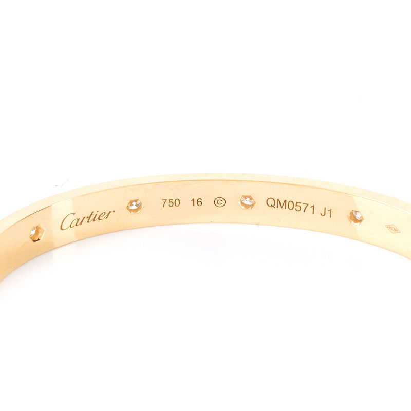 Cartier 18 Karat Yellow Gold and Ten (1) Round Brilliant Cut Diamond Love Bracelet