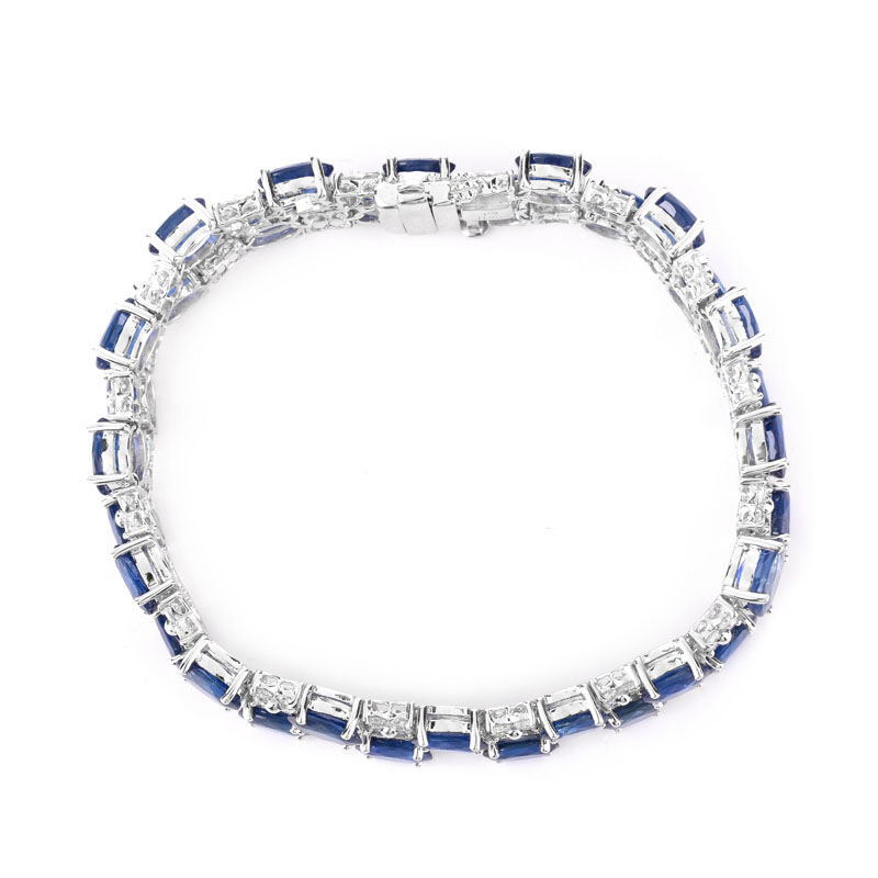 Approx. 31.0 Carat Oval Cut Sapphire, 4.0 Carat Round Brilliant Cut Diamond and 18 Karat White Gold Bracelet