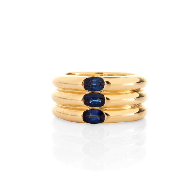 Cartier Approx. 1.10 Carat Oval Cut Sapphire and  18 Karat Yellow Gold 10mm Triple Stack Band Ring.