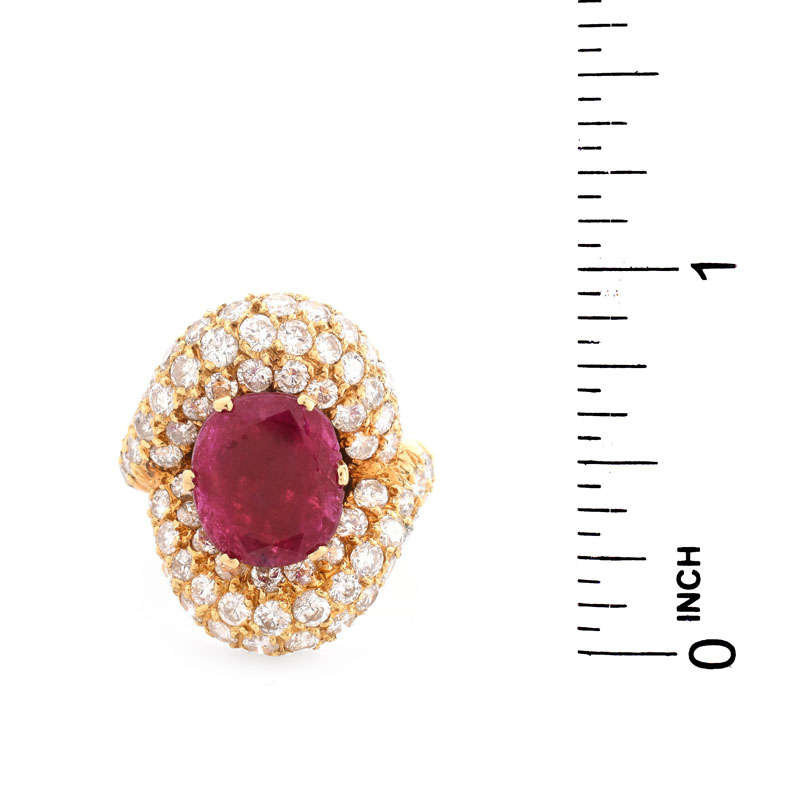 Vintage Approx. 4.0 Carat Pave Set Round Brilliant Cut Diamond, 4.50 Carat Oval Cut Ruby and 18 karat Yellow Gold Ring. 