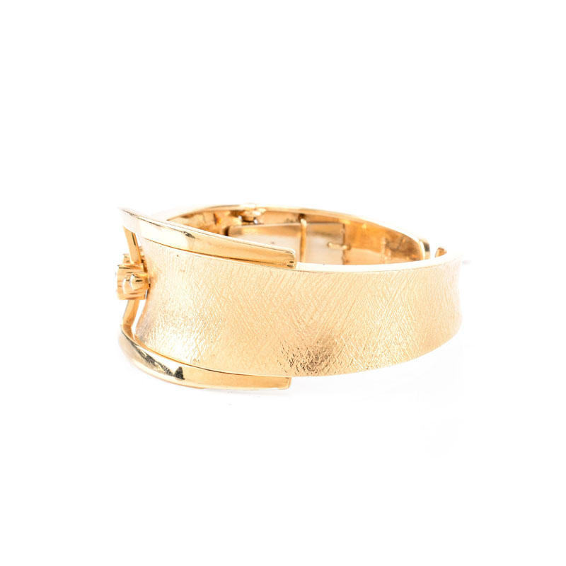 14 Karat Yellow Gold and Ten (10) Round Brilliant Cut Diamond Cuff Bangle Bracelet.