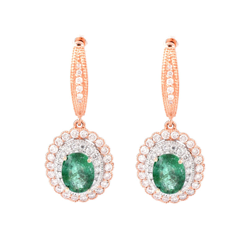Pair of Oval Cut Colombian Emerald, Round Brilliant Cut Diamond and 14 Karat Rose Gold Pendant earrings, Emeralds with vivid color. 