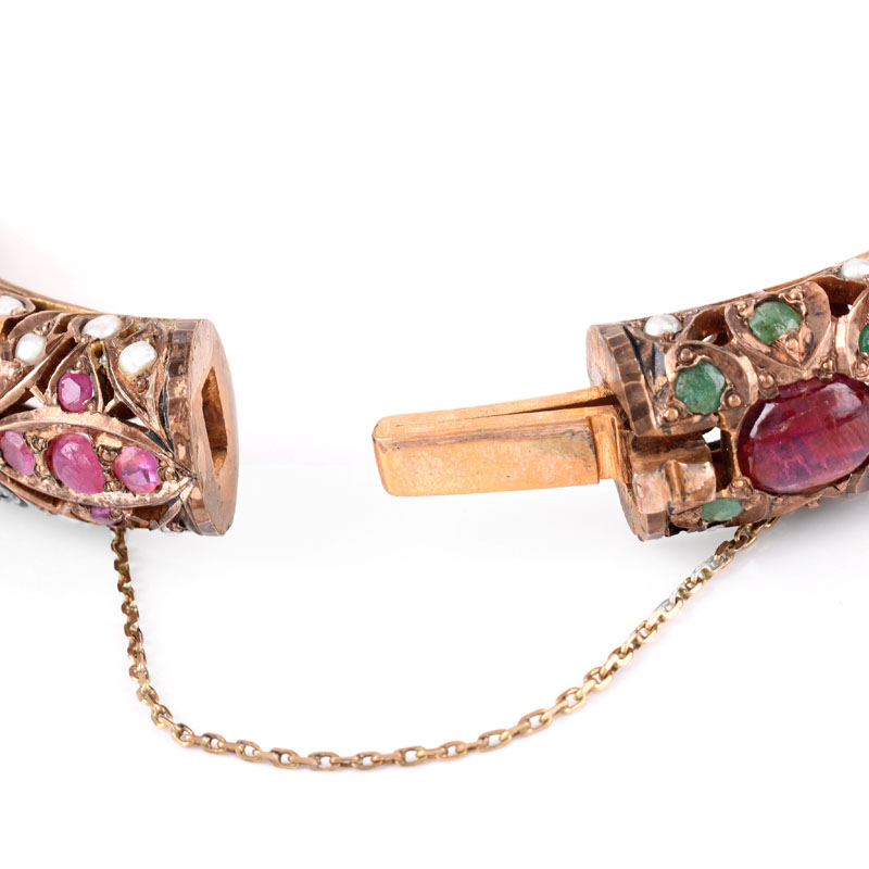 Vintage Ruby, Emerald, Pearl, Silver and Gold-filled Hinged Bangle Bracelet. Unsigned. Missing a small pearl. 