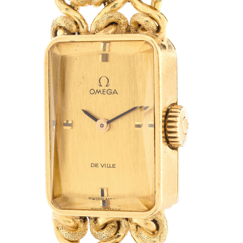Lady's Vintage Omega De Ville 18 Karat Yellow Gold Bracelet Watch with Manual Movement.