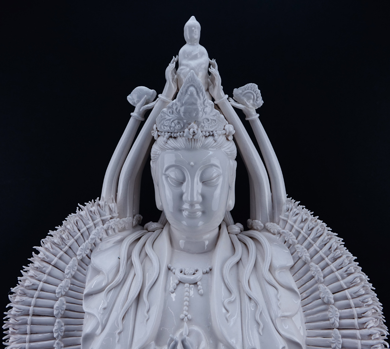 Large Chinese Blanc de Chine Guanyin with a Thousand Arms On Wooden Base.