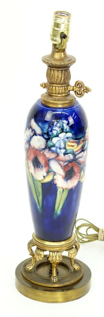 A Moorcroft Iris Pottery Vase Mounted as Lamp. Good condition.