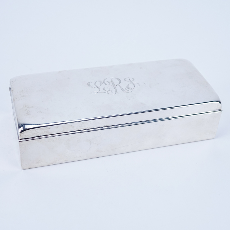 Poole Sterling Silver Cigarette Box. Wood lined. Signed. Good condition. Measures 2" H x 7-1/2" L x 3-1/4" D.