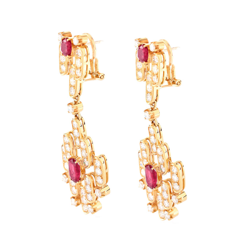 Vintage Approx. 7.50 Carat Round Brilliant Cut Diamond, 3.50 Carat Oval and Round Cut Ruby and 18 Karat Yellow Gold Pendant Earrings, en suite with the previous lot.